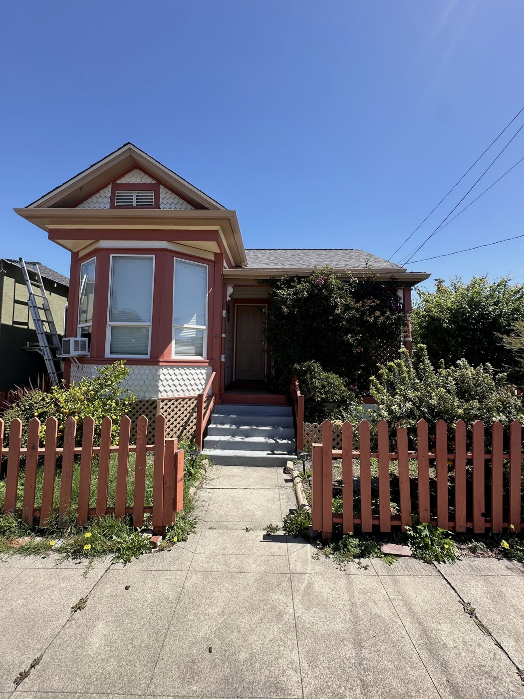 The house from the street in April 2024