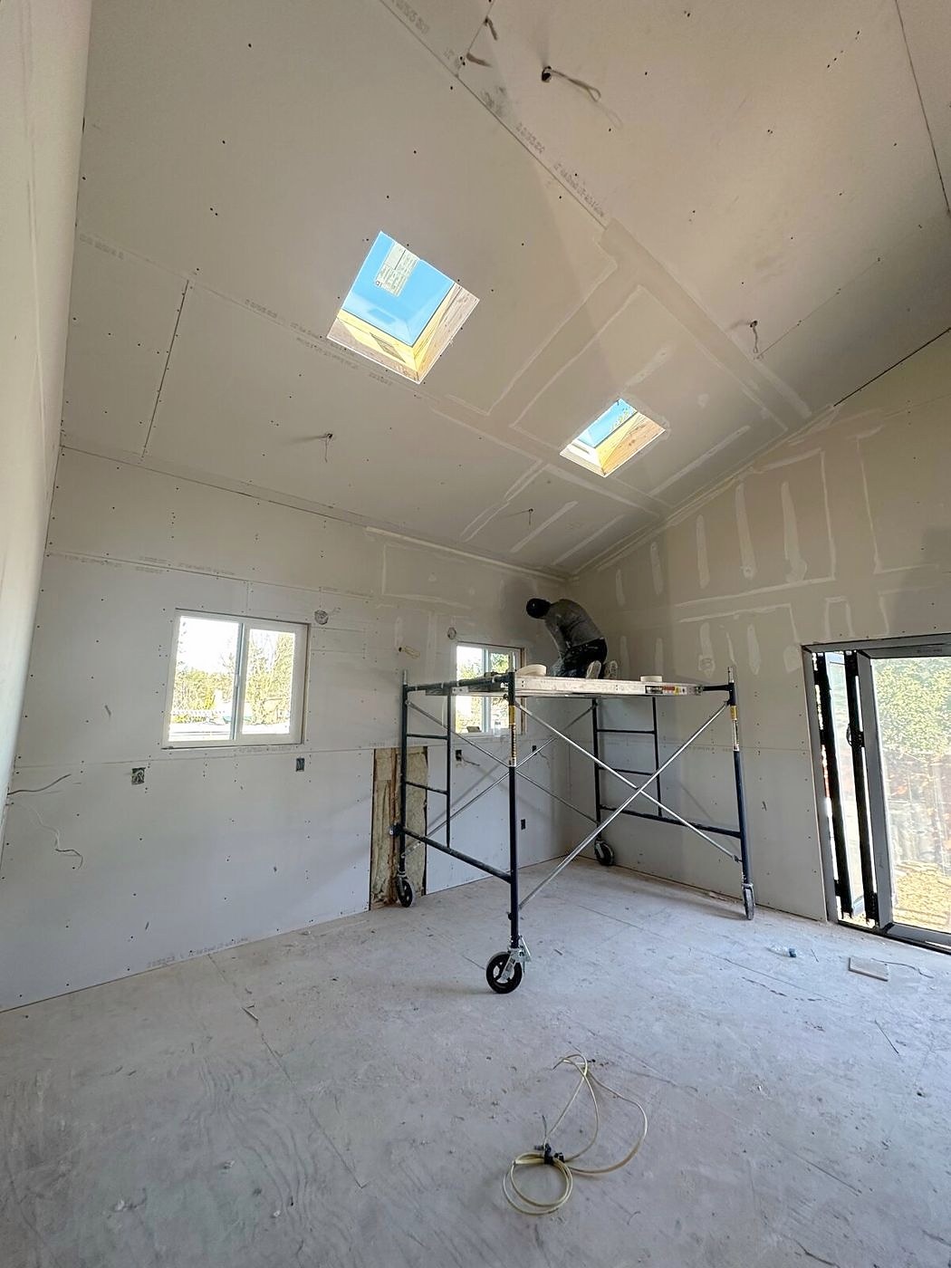 Vaulted ceiling with two new skylights before finishing