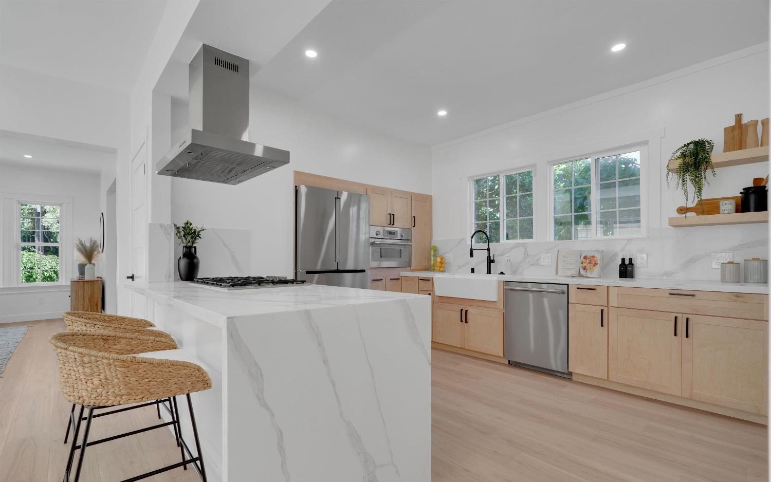 The new kitchen with a stone peninsula