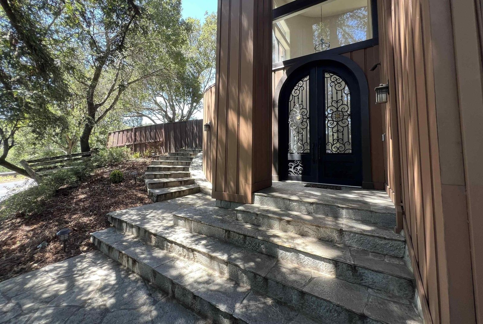 The front entry before, with iron doors