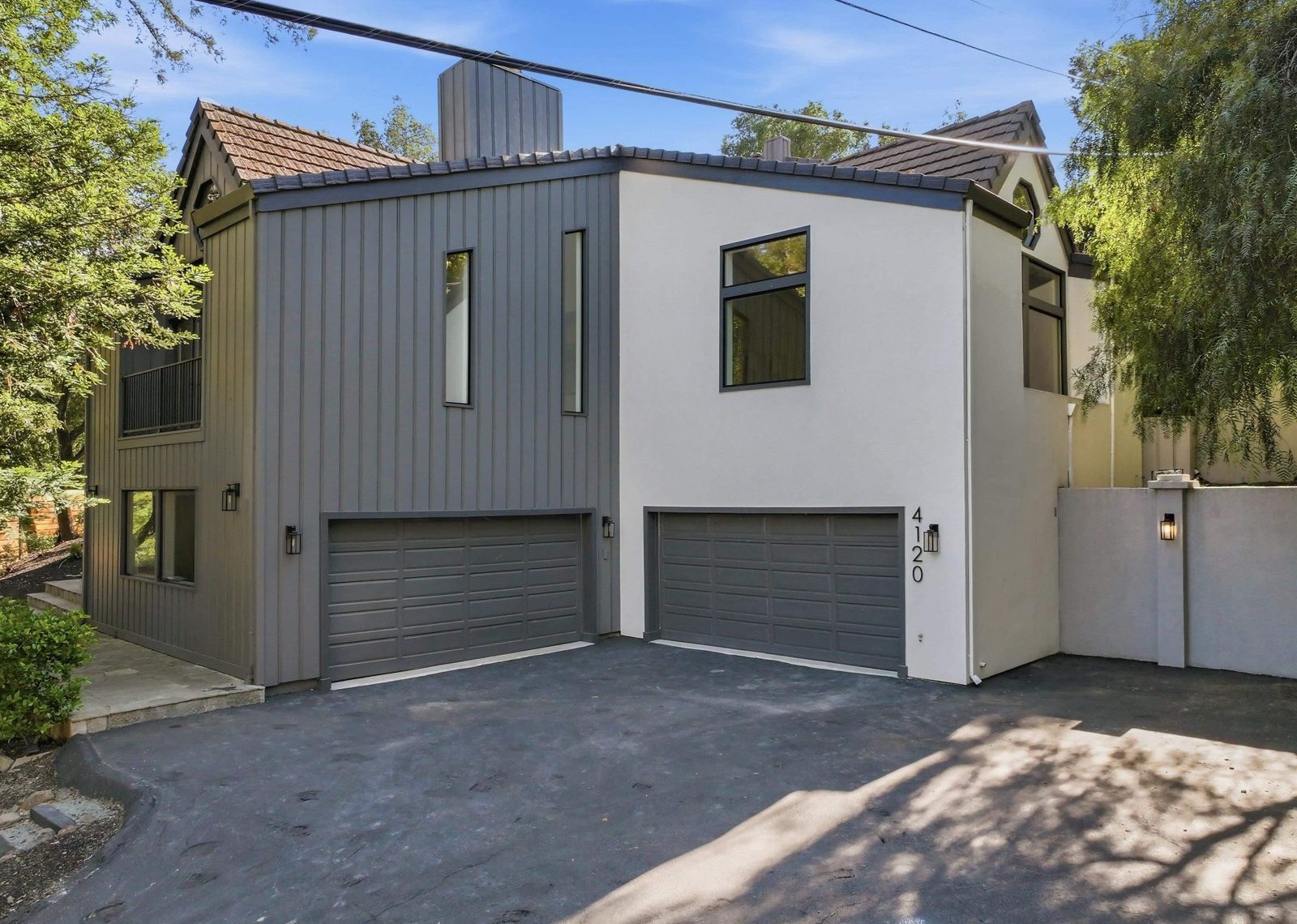 The house from the drive after the renovation