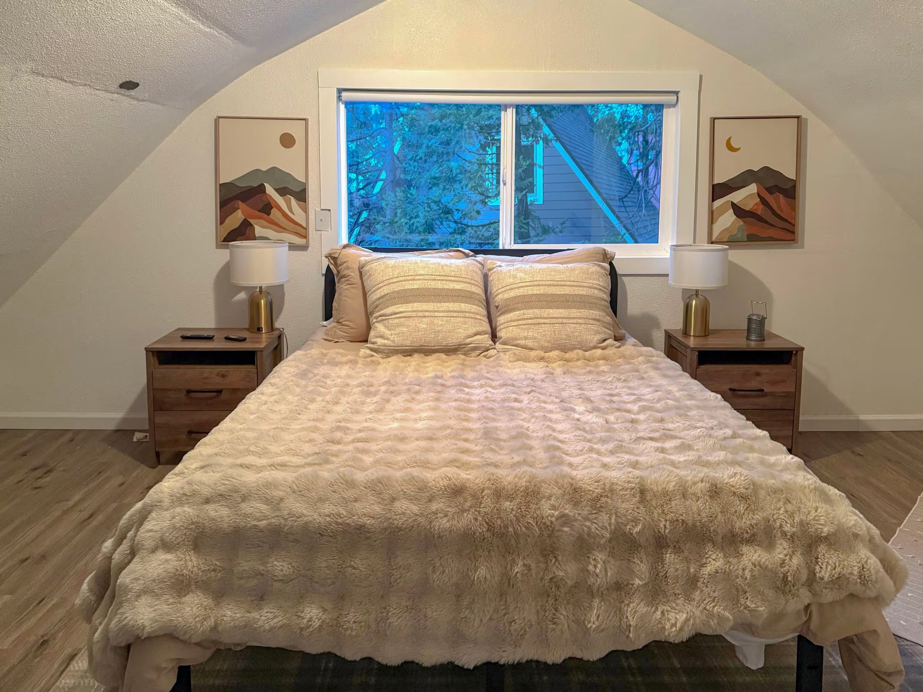 An upstairs bedroom under the roofline