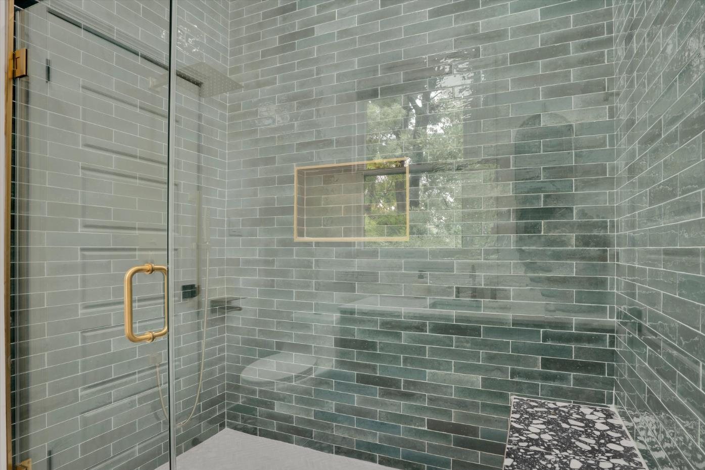 The upstairs bath after, green tile with gold trim