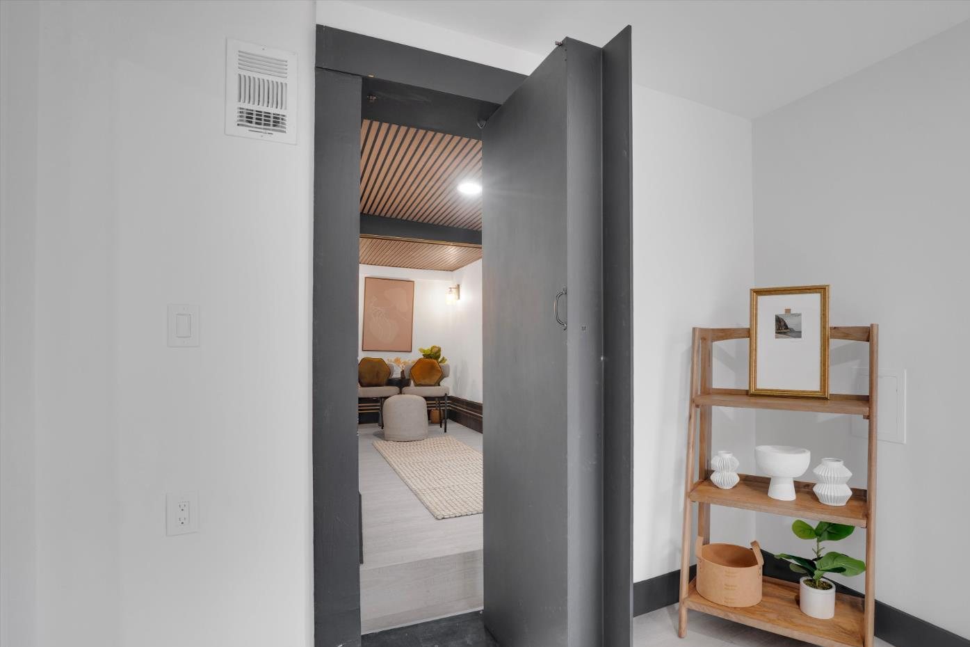 The hidden door swung open